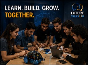A team of young adults building and discussing around an mBot robot